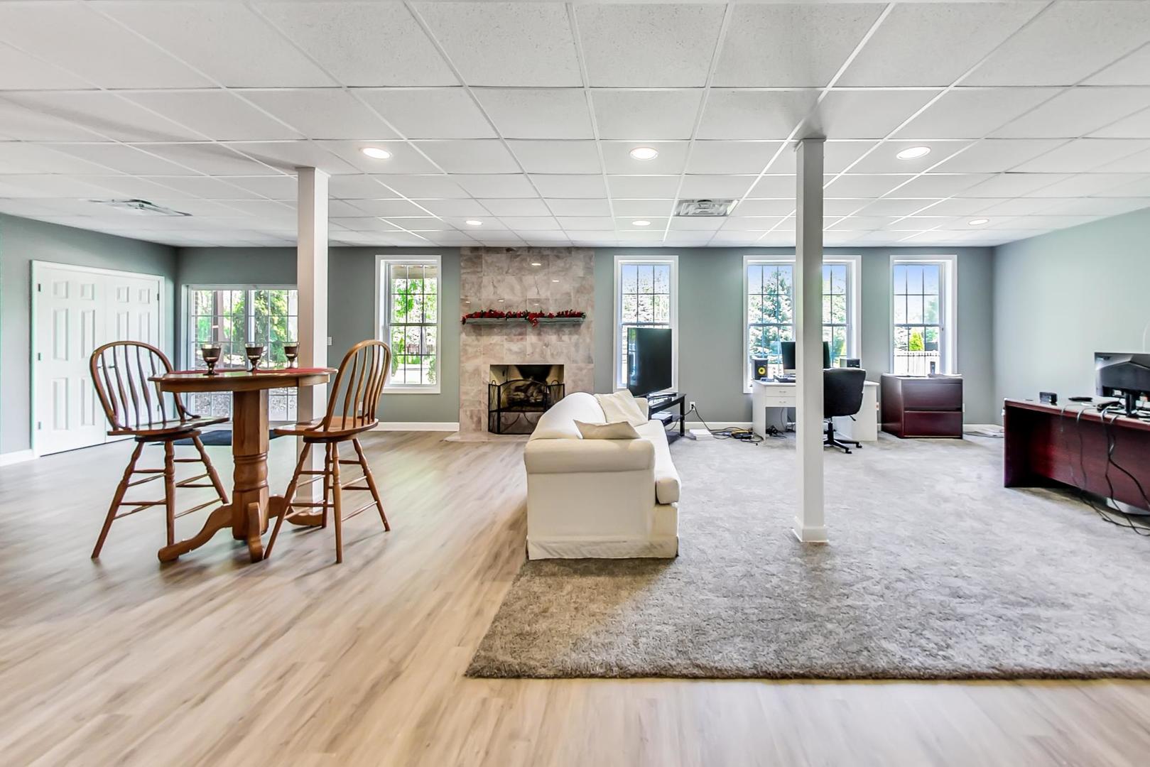 2101 Bull Ridge Drive McHenry, IL 60050 - Photo 45 of 83 a living room with furniture and a wooden floor