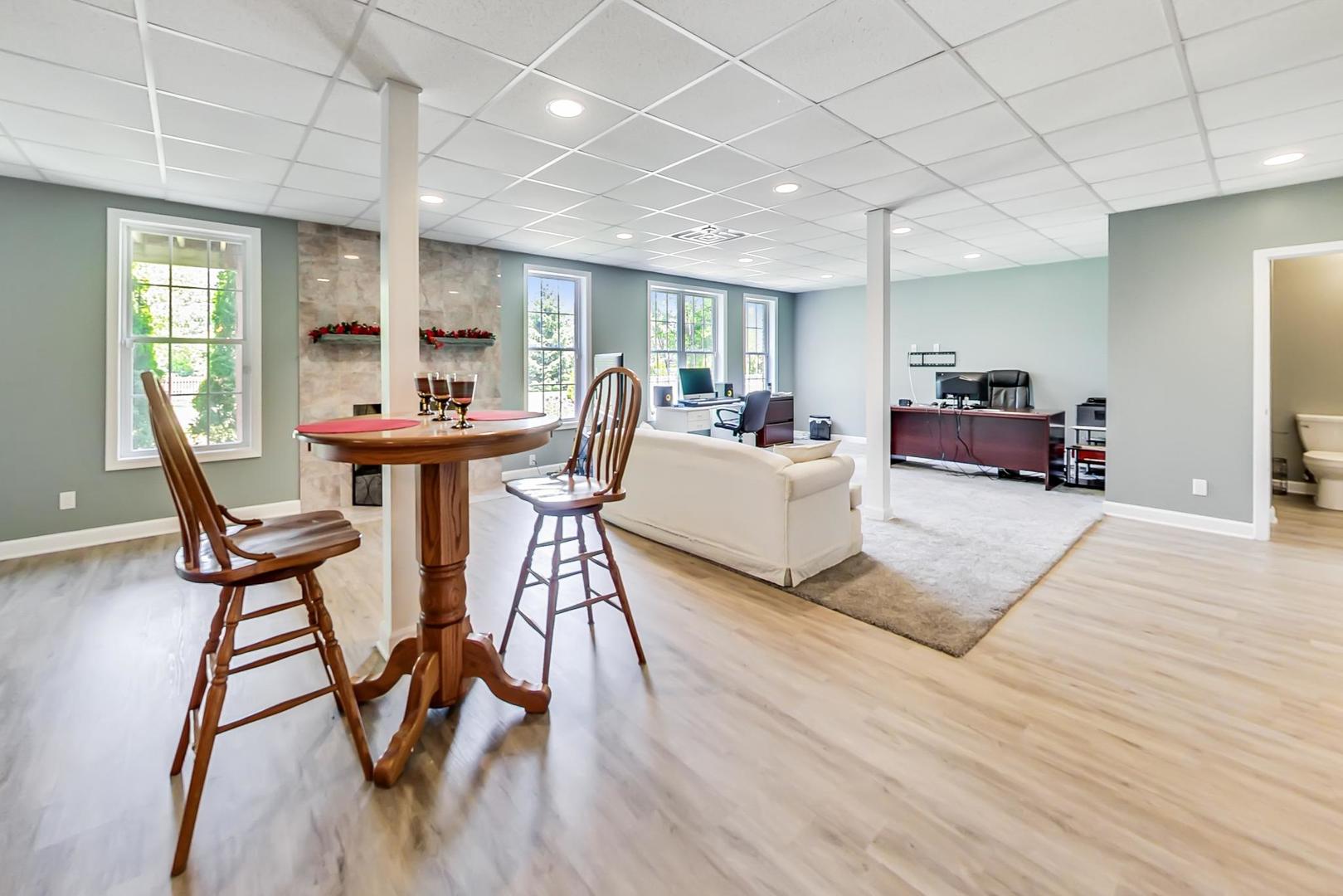 2101 Bull Ridge Drive McHenry, IL 60050 - Photo 46 of 83 a living room with furniture and a wooden floor
