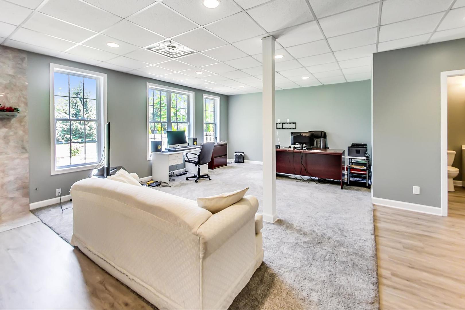 2101 Bull Ridge Drive McHenry, IL 60050 - Photo 47 of 83 a living room with furniture and a large window