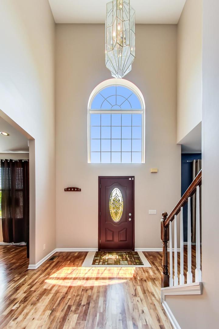 2101 Bull Ridge Drive McHenry, IL 60050 - Photo 6 of 83 a view of an entryway with a fireplace