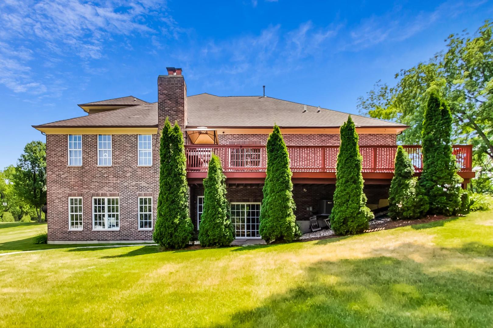 2101 Bull Ridge Drive McHenry, IL 60050 - Photo 65 of 83 a front view of a house with garden