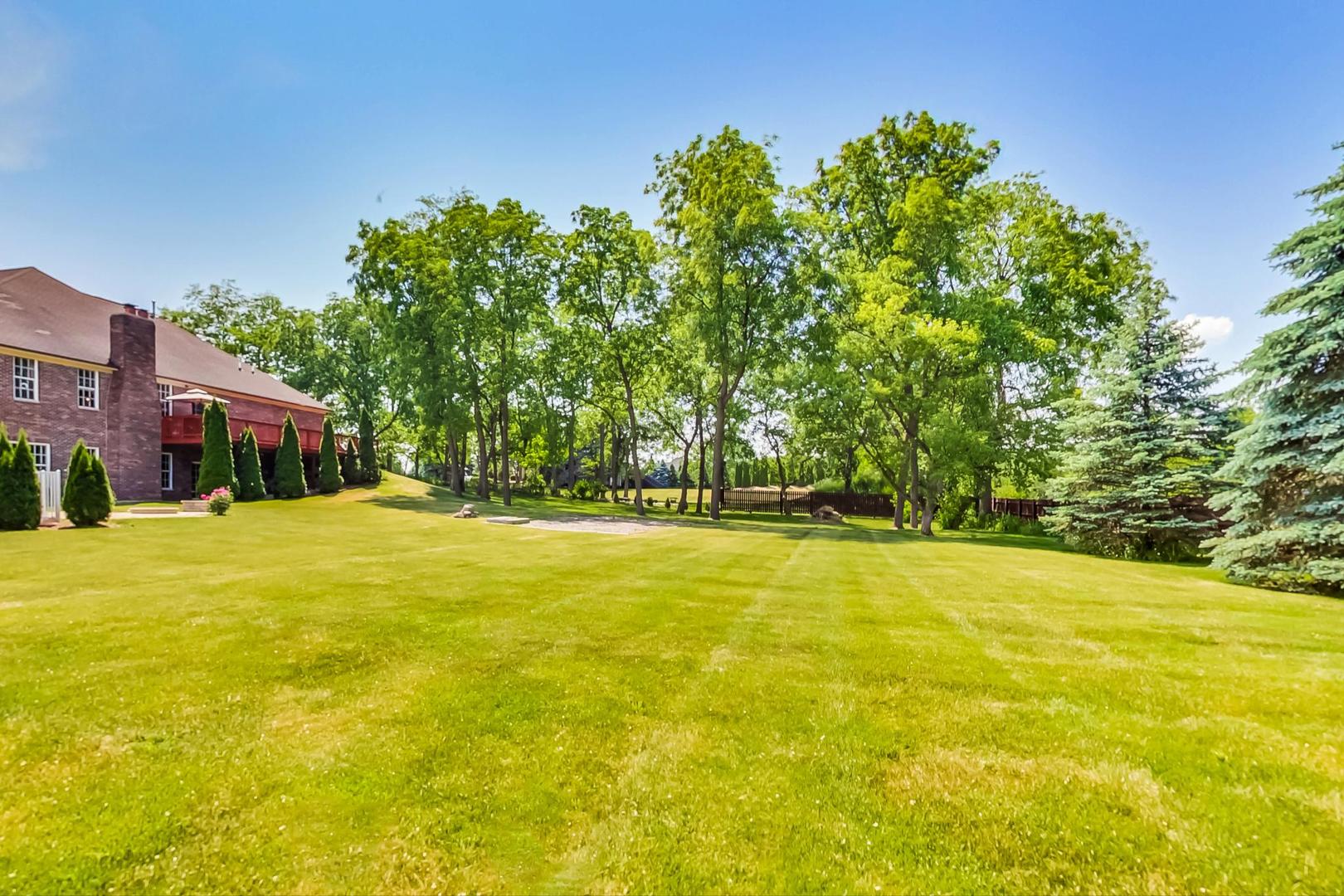 2101 Bull Ridge Drive McHenry, IL 60050 - Photo 78 of 83 a house with swimming pool in front of it
