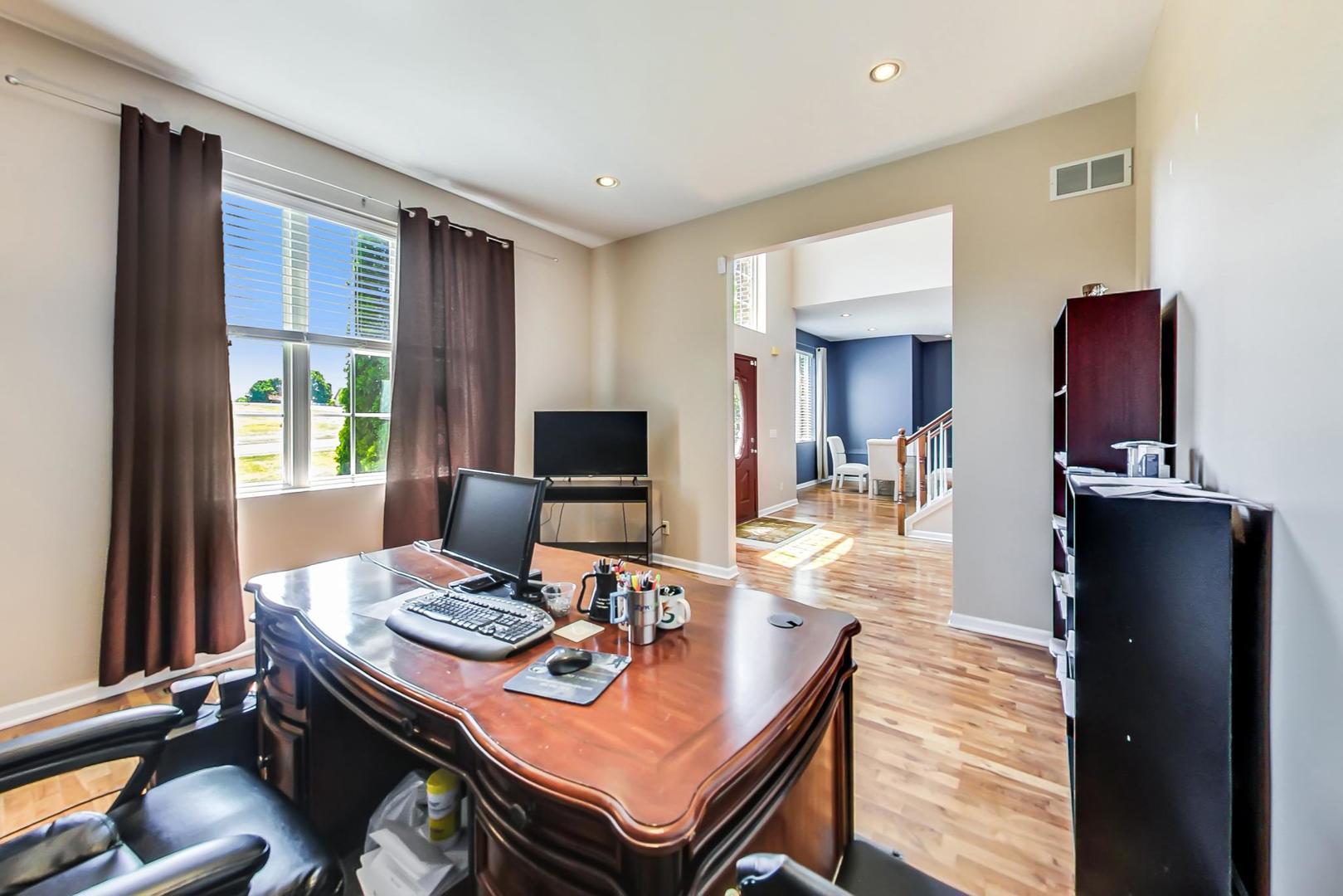 2101 Bull Ridge Drive McHenry, IL 60050 - Photo 10 of 83 a view of a dining room with furniture window and outside view