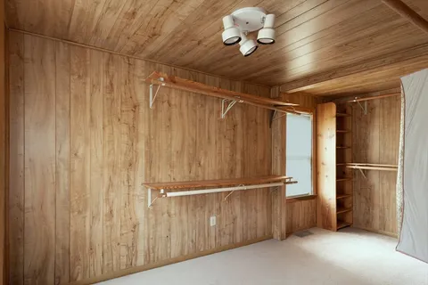 a view of a refrigerator in a room