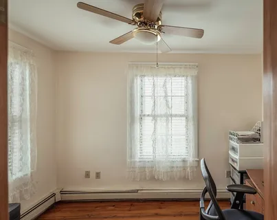 a bedroom with bed or furniture and a chandelier