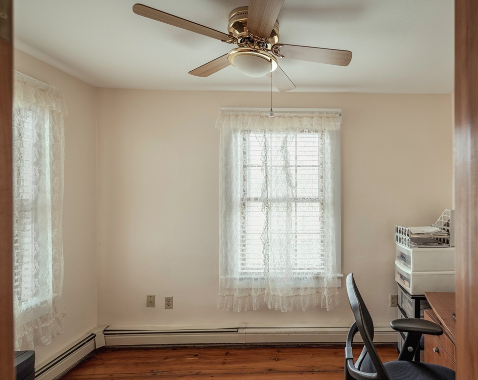 21-23 East Main Street Merrimac, MA 01860 - Photo 22 of 31 a view of workspace with wooden floor and windows