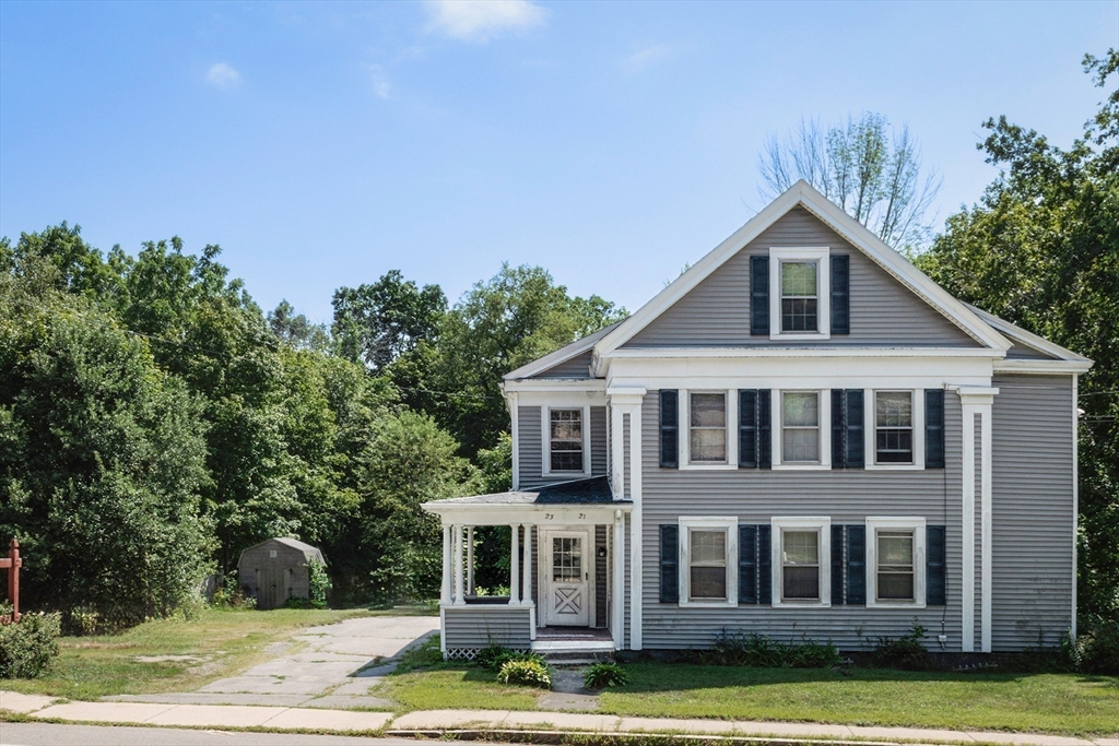 21-23 East Main Street Merrimac, MA 01860 - Photo 31 of 31 a front view of a house with a yard
