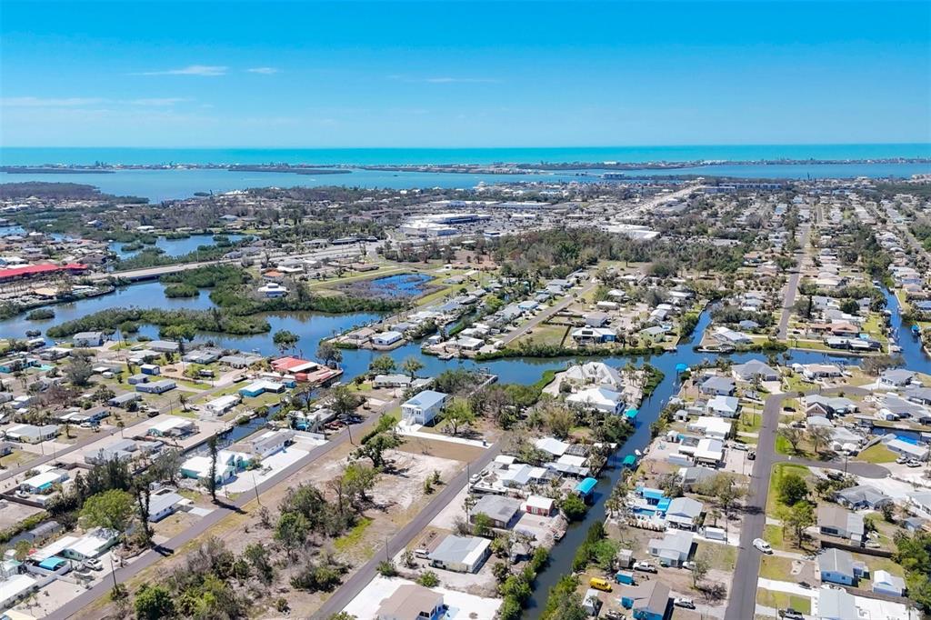 2 Andrews Street Englewood, FL 34224 - Photo 2 of 2 an aerial view of residential building and lake