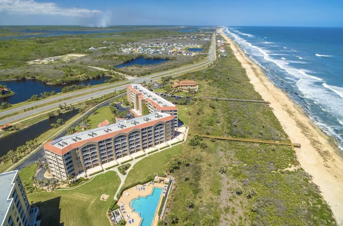 a view of a balcony with an ocean view