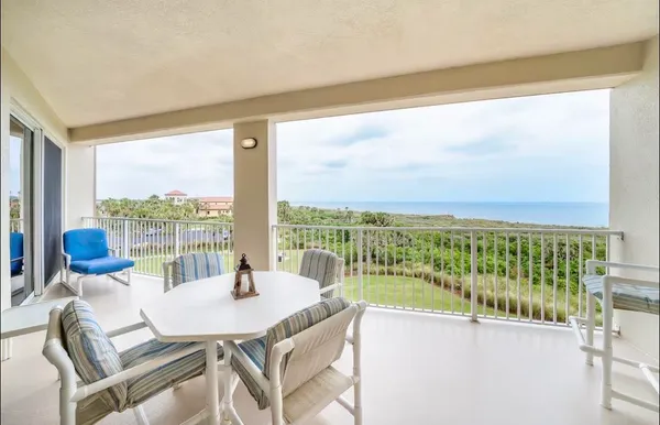 a view of a balcony with lake view and a ocean view