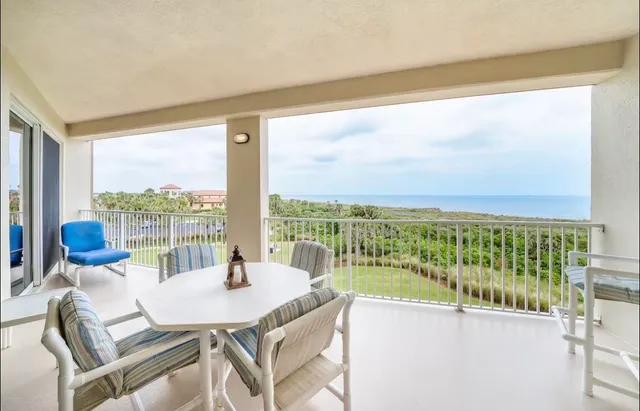 a view of a balcony with lake view and a ocean view