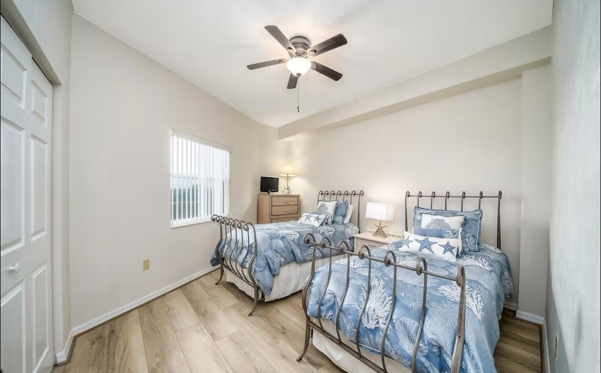 104 Surfview Drive, Unit 1307 Palm Coast, FL 32137 - Photo 4 of 17 a living room with furniture and a large window