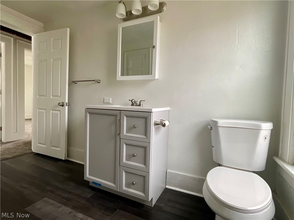 425 Spaulding Street Akron, OH 44310 - Photo 10 of 17 Bathroom featuring vanity and dark wood-style flooring