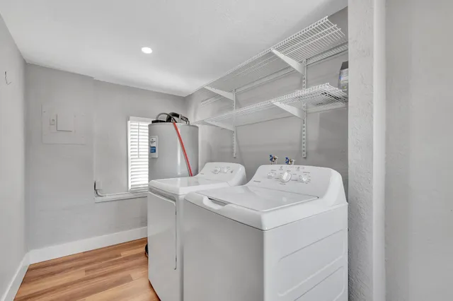 a utility room with dryer and washer