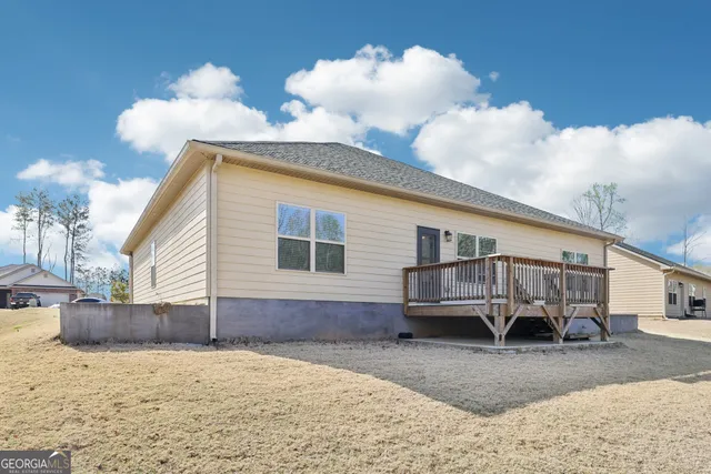 a house view with a backyard space