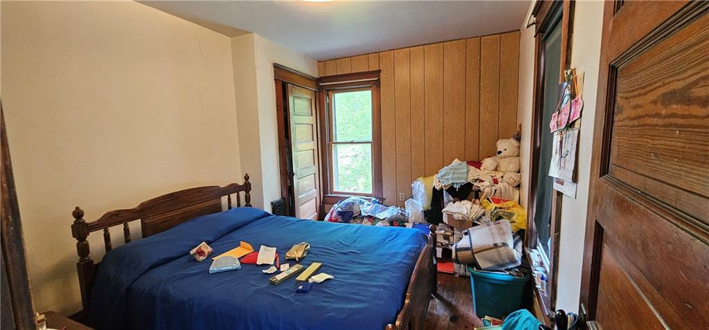 417 Uber Street New Castle, PA 16101 - Photo 16 of 43 a living room with furniture and a window