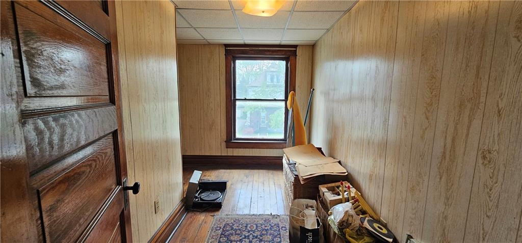 417 Uber Street New Castle, PA 16101 - Photo 24 of 43 a view of a hallway with wooden floor and staircase
