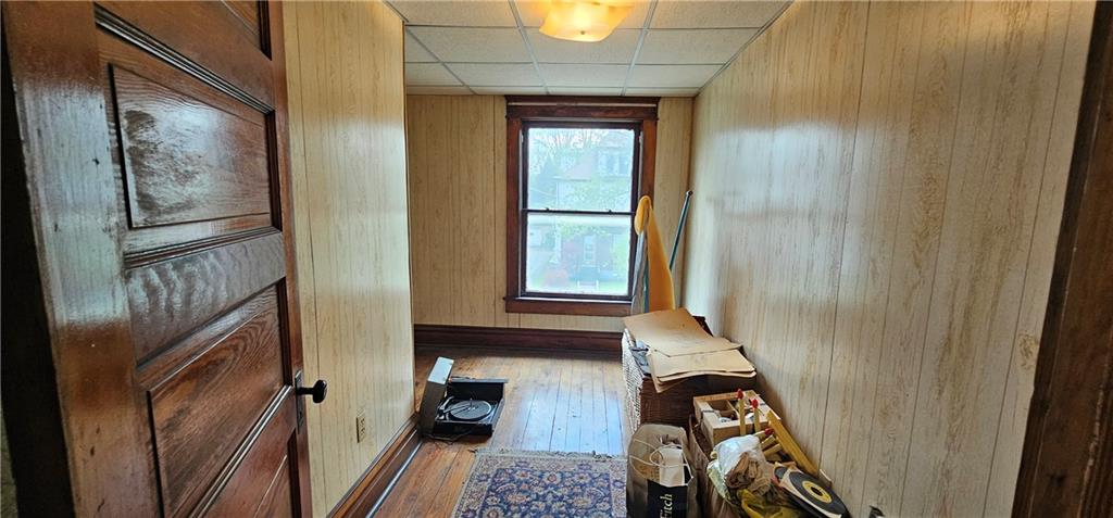 417 Uber Street New Castle, PA 16101 - Photo 25 of 43 a view of a hallway with wooden floor and staircase