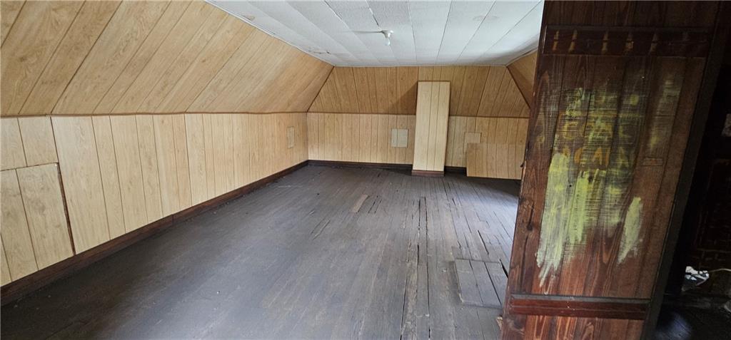 417 Uber Street New Castle, PA 16101 - Photo 27 of 43 a view of a room with wooden floor