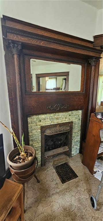 417 Uber Street New Castle, PA 16101 - Photo 3 of 43 a living room with a fireplace and a fireplace