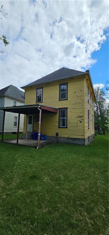 417 Uber Street New Castle, PA 16101 - Photo 36 of 43 a view of a house with a backyard