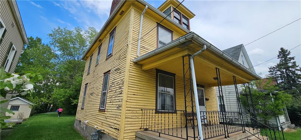 417 Uber Street New Castle, PA 16101 - Photo 40 of 43 a view of a house with a yard