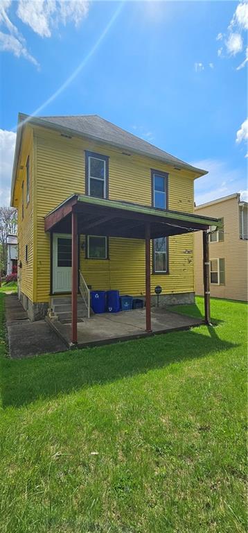 417 Uber Street New Castle, PA 16101 - Photo 43 of 43 a view of backyard with a garden and entertaining space