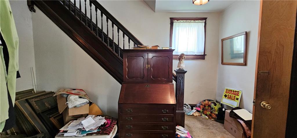 417 Uber Street New Castle, PA 16101 - Photo 5 of 43 a view of walk in closet with clothes and shoes