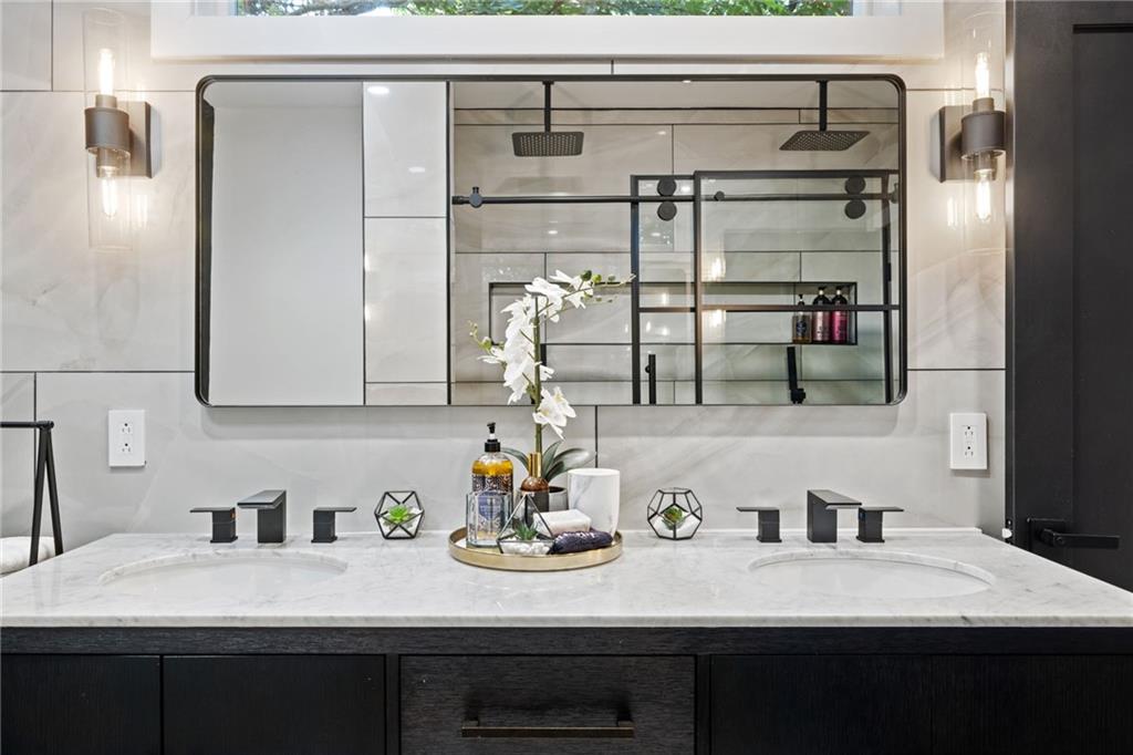 1112 James Street Pittsburgh, PA 15212 - Photo 13 of 26 a bathroom with a sink and a mirror