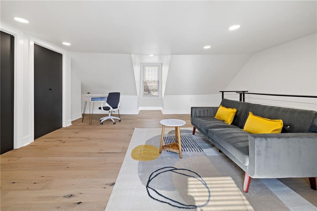 1112 James Street Pittsburgh, PA 15212 - Photo 23 of 26 a bed room with a bed and bathroom