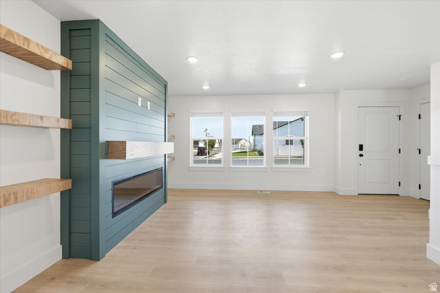 730 West 500 North Smithfield, UT 84335 - Photo 5 of 46 Living area featuring light wood-finish flooring, recessed lighting, and white walls