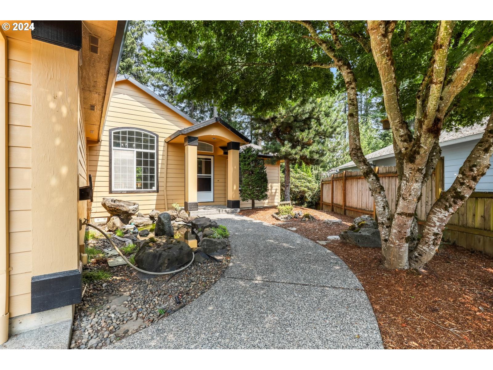 37441 Solso Drive Sandy, OR 97055 - Photo 4 of 48 a view of backyard of house with outdoor seating