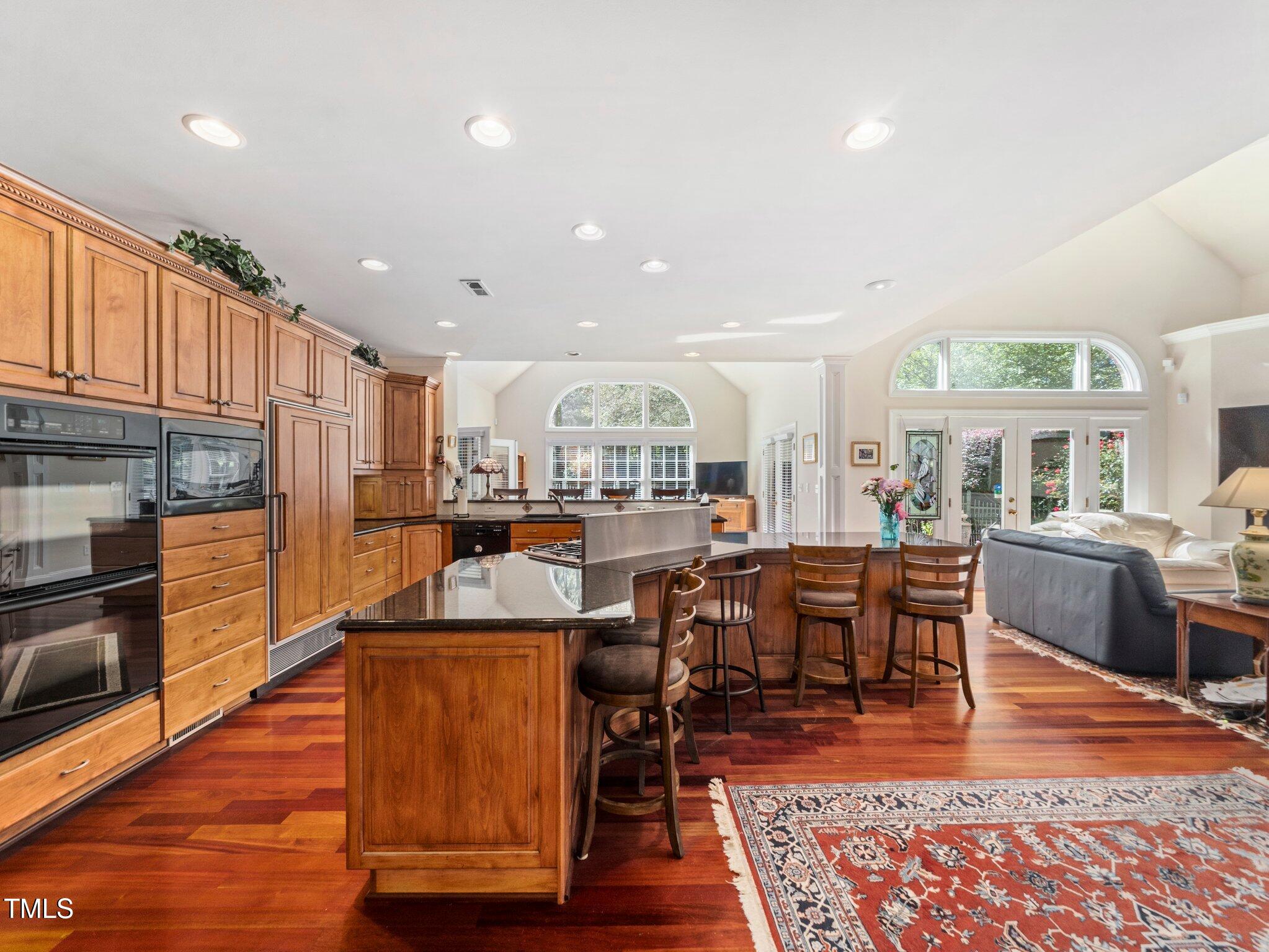 10937 Cahill Road Raleigh, NC 27614 - Photo 16 of 53 Gourmet Kit has 2 Wall Ovens, Microwave Sub Zero Refrig w/Wood Panel to Match Classic Cabinetry