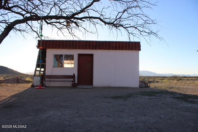 1201 East Old Stewart Road Willcox, AZ 85643 - Photo 40 of 49 a view of a house with a yard