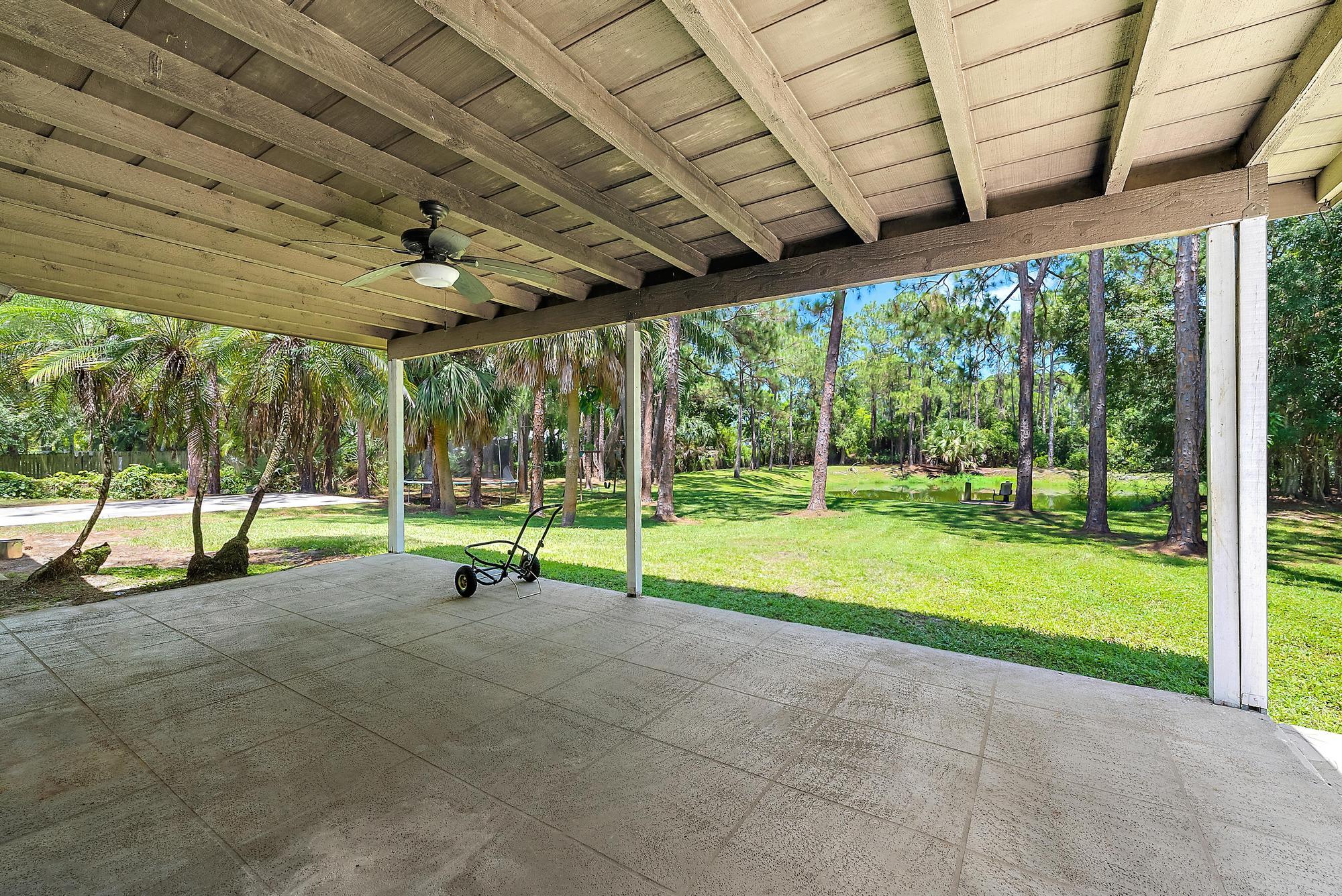18222 126th Terrace North Jupiter, FL 33478 - Photo 15 of 21 18222 126th Terrace N- Rear Porch