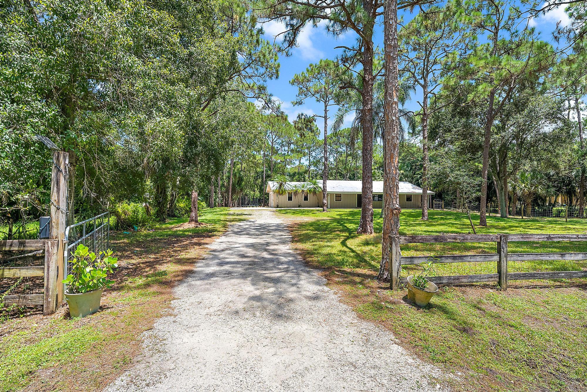 18222 126th Terrace North Jupiter, FL 33478 - Photo 17 of 21 18222 126th Terrace N-Driveway