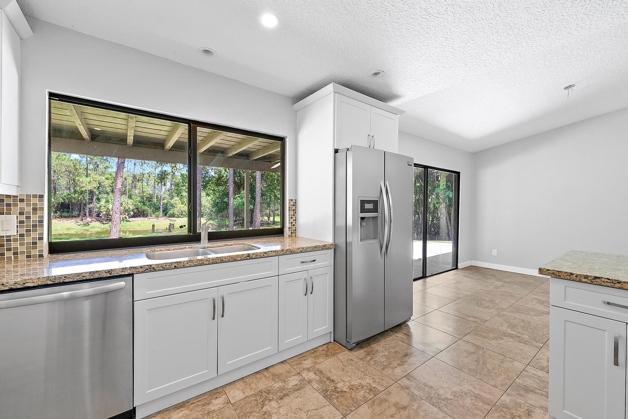 18222 126th Terrace North Jupiter, FL 33478 - Photo 5 of 21 18222 126th Terrace N-Kitchen 1