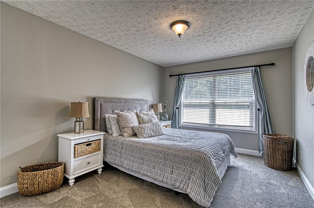 108 Seaton Crest Drive Mars, PA 16046 - Photo 15 of 25 a bedroom with a bed and a window