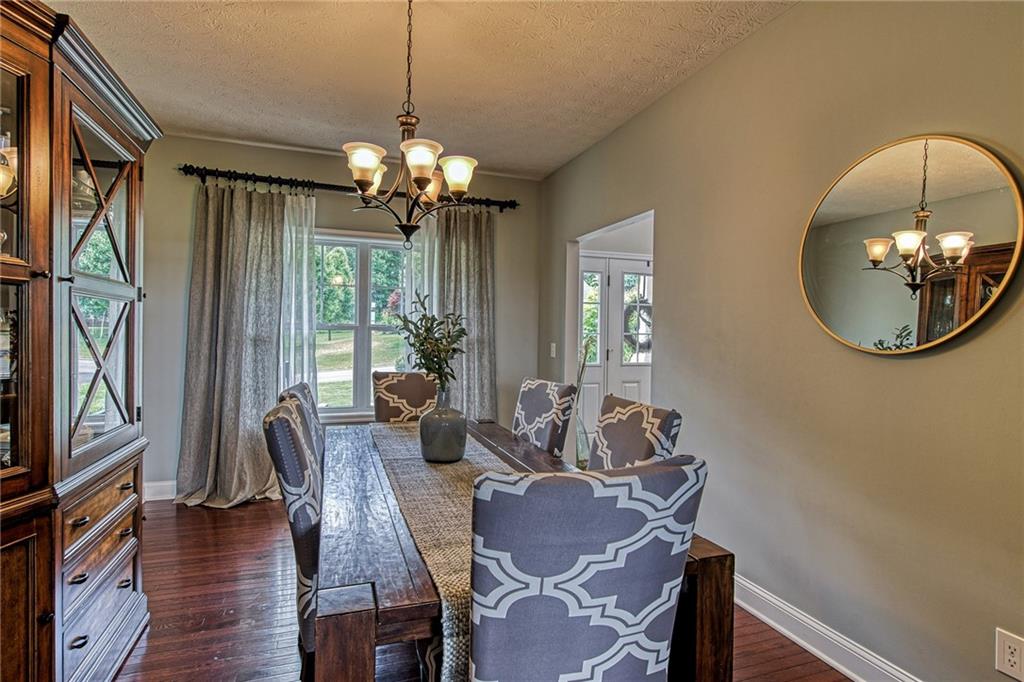 108 Seaton Crest Drive Mars, PA 16046 - Photo 9 of 25 a view of a dining room with furniture window and wooden floor