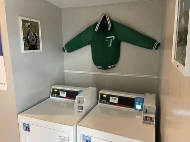 a utility room with dryer and washer