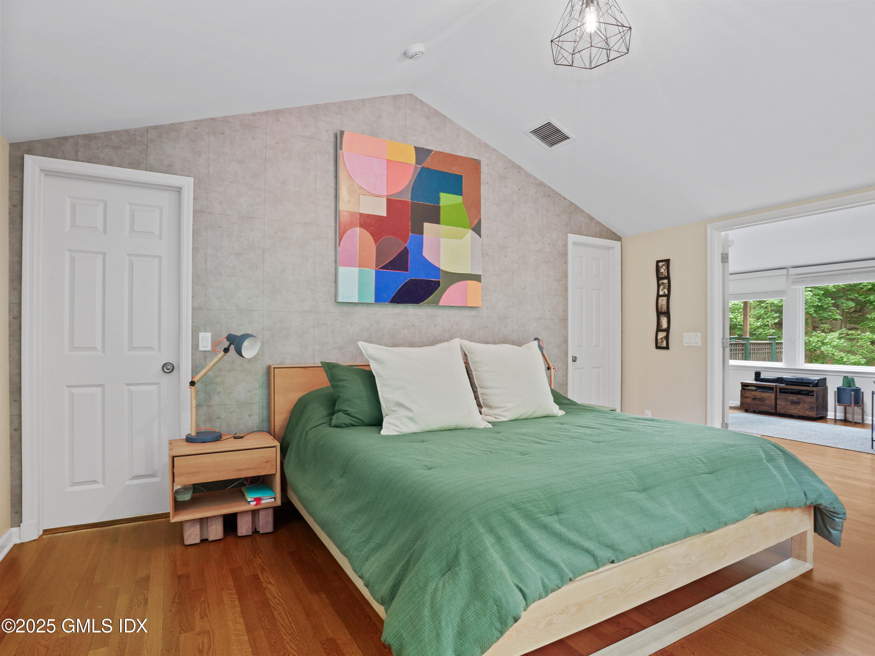 25 Jeffrey Road Greenwich, CT 06830 - Photo 16 of 35 a bedroom with a bed and a couch