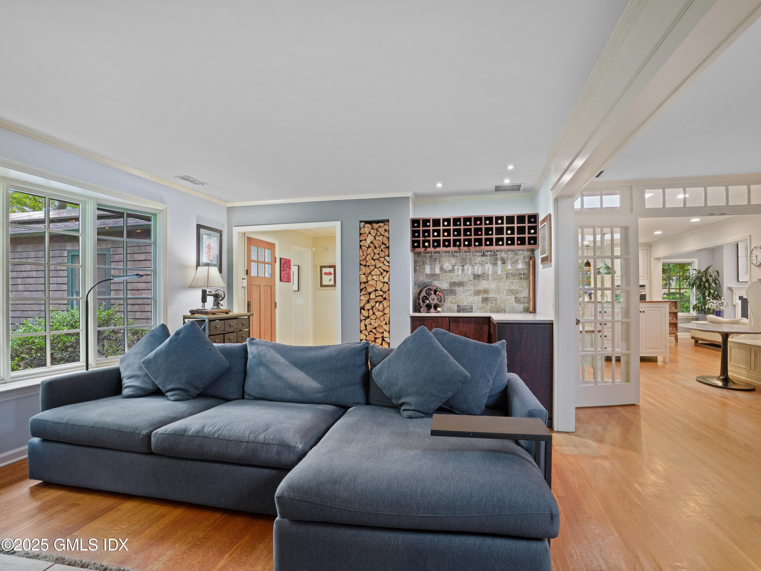 25 Jeffrey Road Greenwich, CT 06830 - Photo 4 of 35 a living room with furniture and a large window