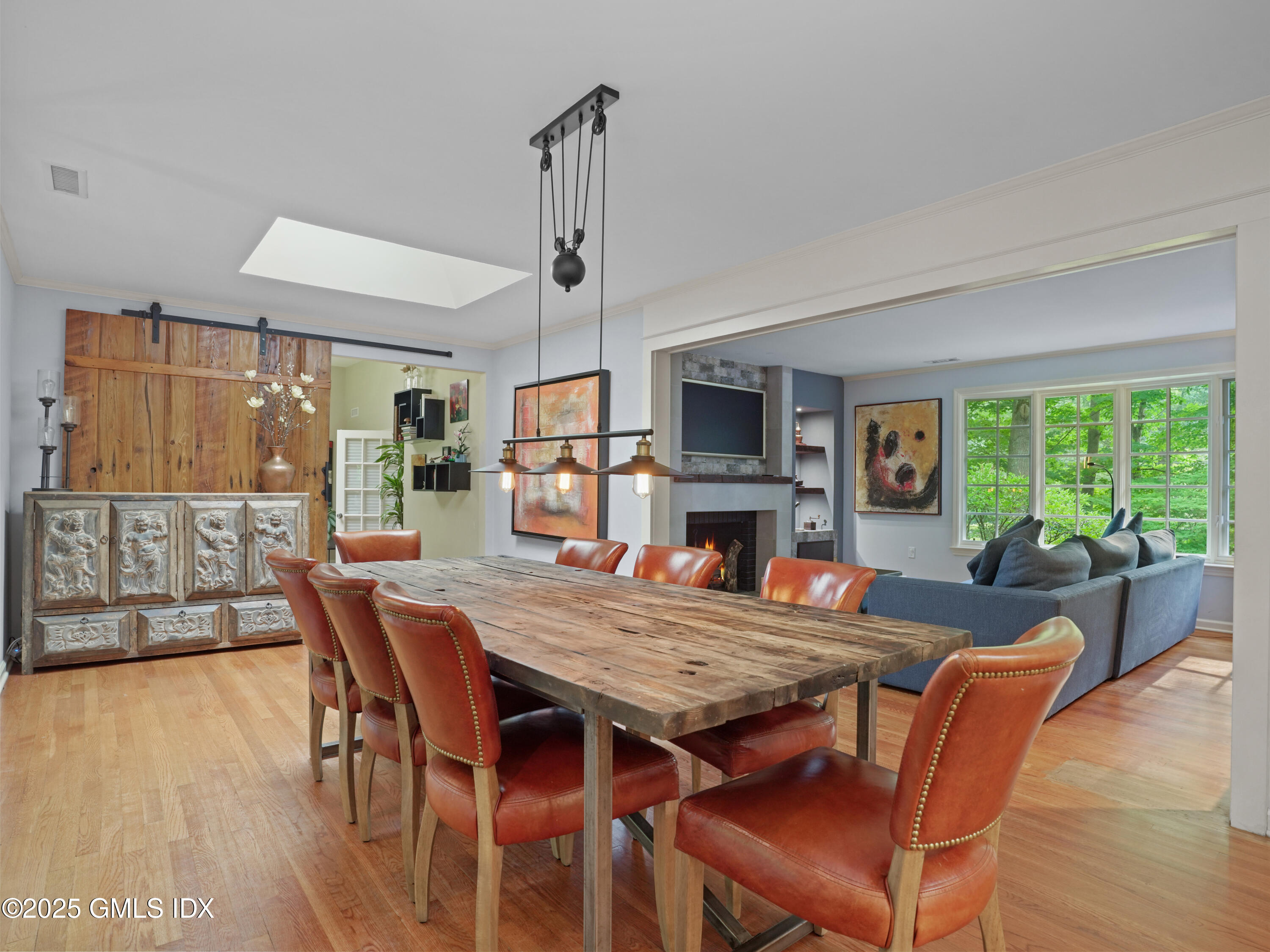 25 Jeffrey Road Greenwich, CT 06830 - Photo 6 of 35 a view of a dining room with furniture window and wooden floor