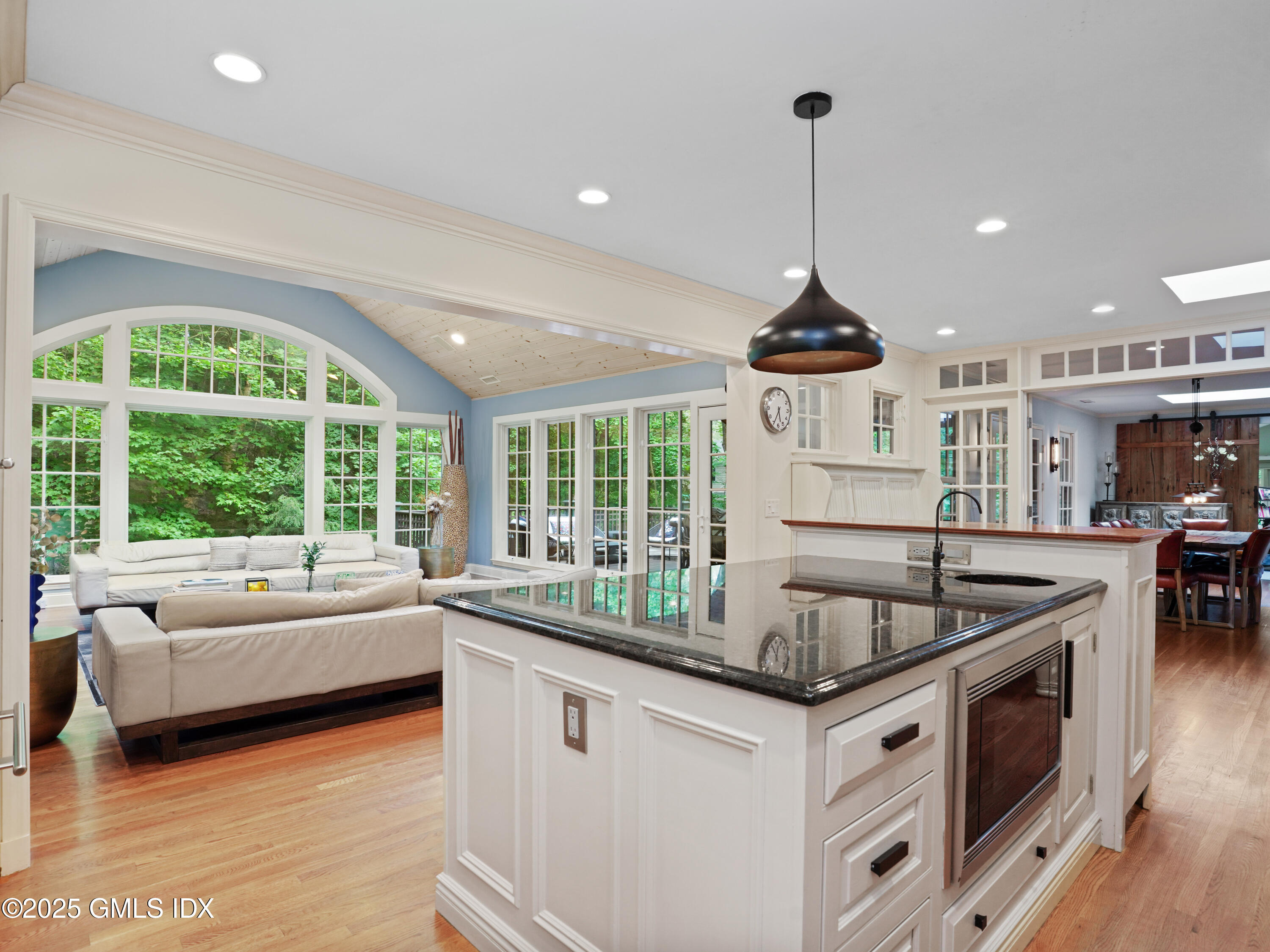25 Jeffrey Road Greenwich, CT 06830 - Photo 10 of 35 a kitchen with granite countertop a sink and a stove