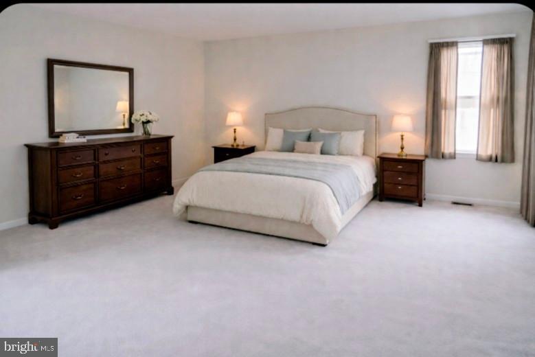 415 Country Way Mickleton, NJ 08056 - Photo 18 of 26 a bedroom with a bed and a dresser