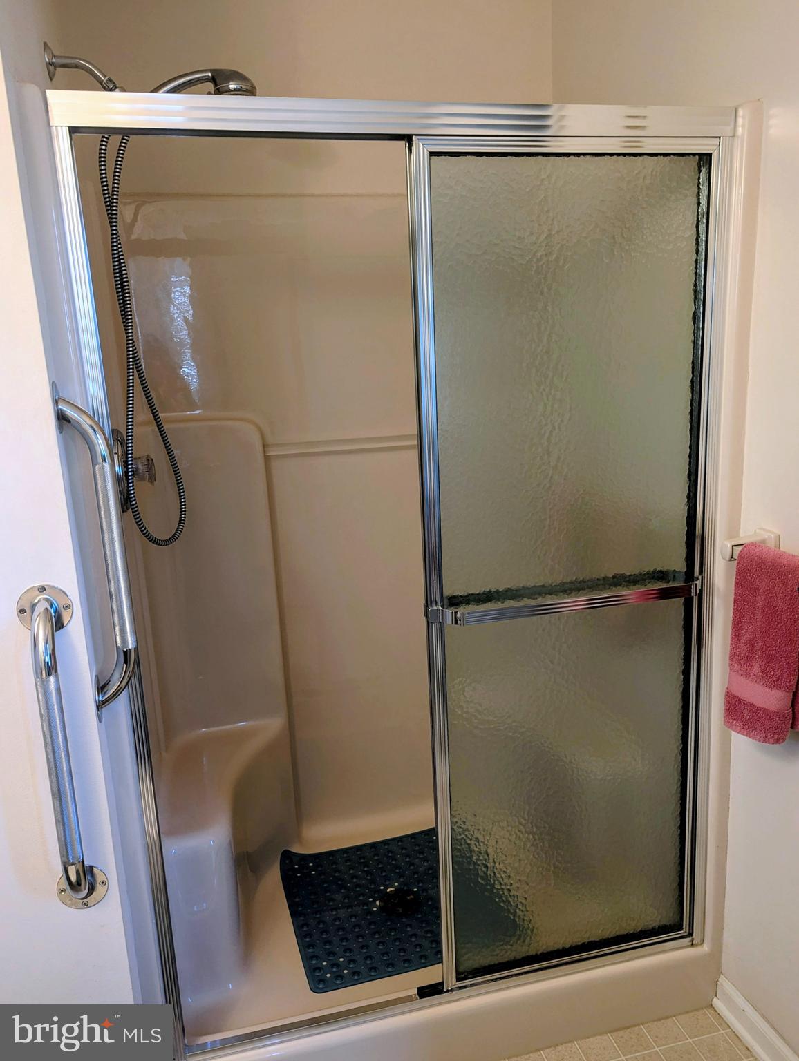 415 Country Way Mickleton, NJ 08056 - Photo 21 of 26 a bathroom with a glass shower door