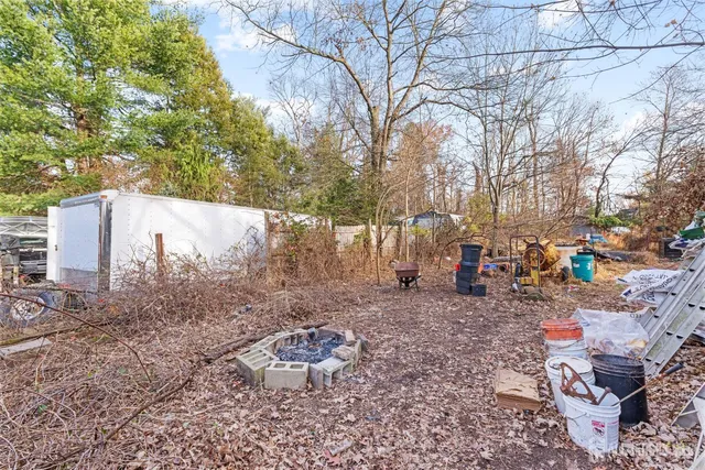 a backyard of a house with seating space