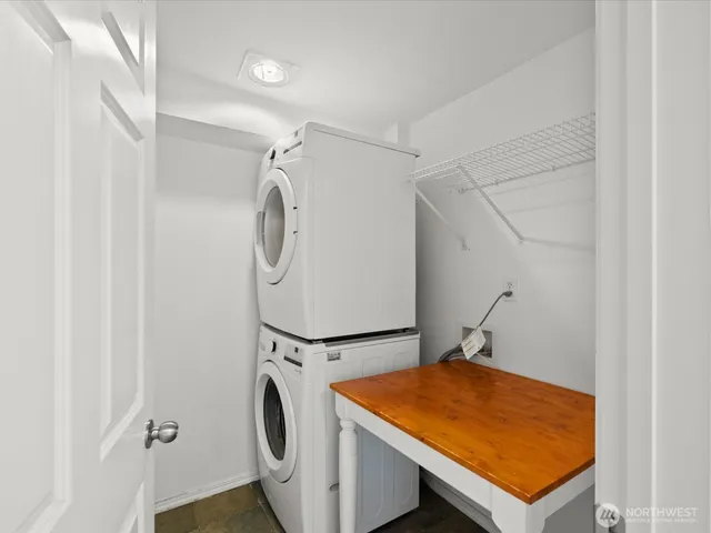 a room with table and white walls