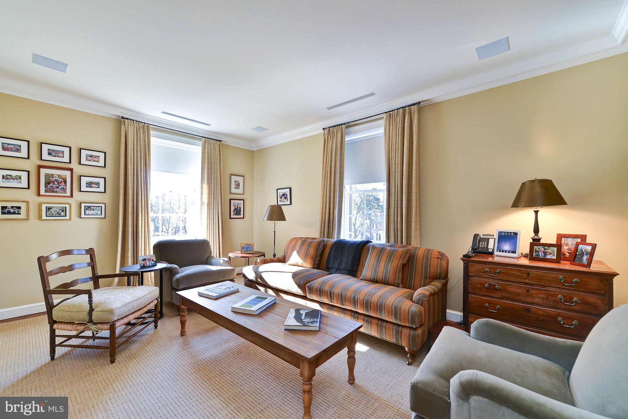 1901 24th Street Northwest Washington, DC 20008 - Photo 20 of 27 a living room with furniture and a large window