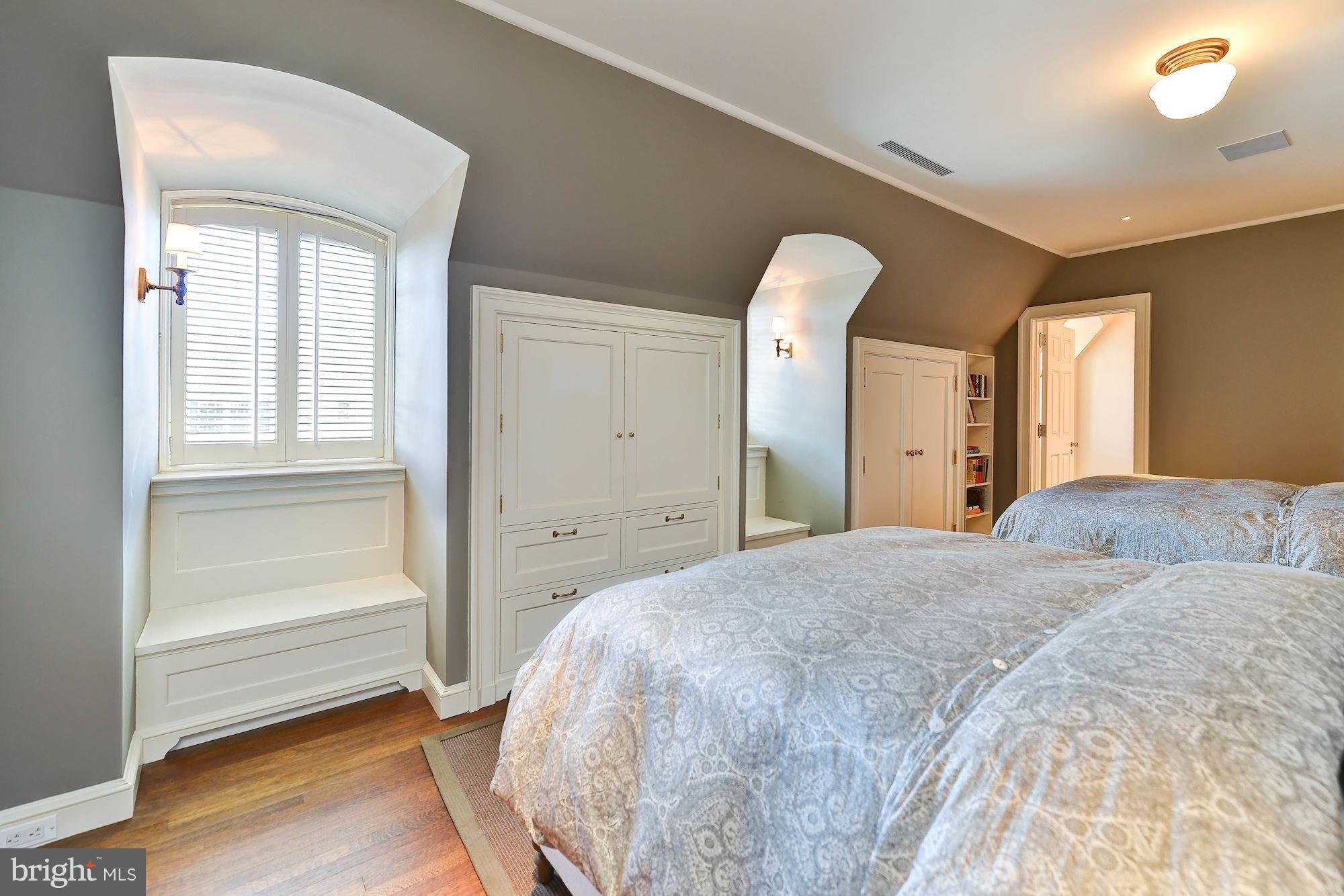 1901 24th Street Northwest Washington, DC 20008 - Photo 23 of 27 a bedroom with a bed and a dresser